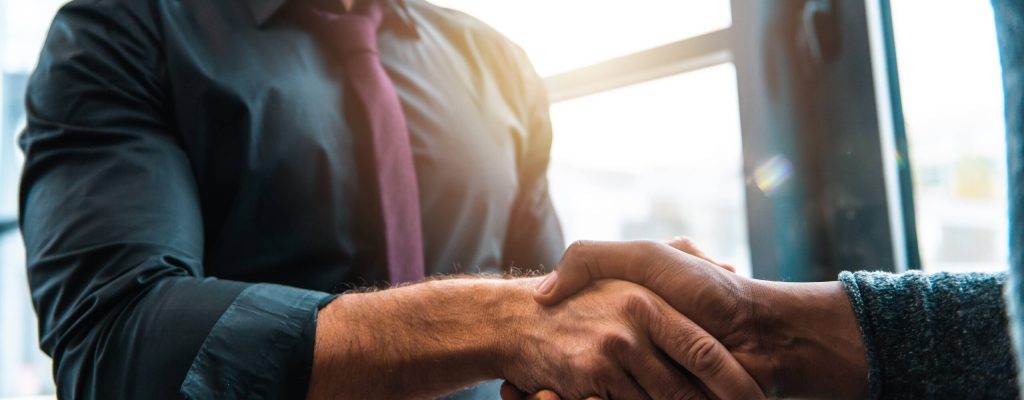 handshaking-business-people-office-as-concept-teamwork-partnership (1)